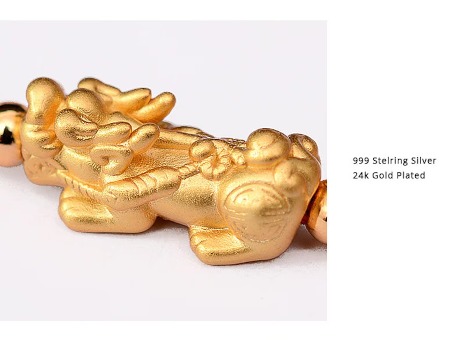 24k gold plated pixiu charm detailed closeup