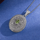 925 sterling silver peridot locket pendant front view