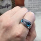 Adjustable owl ring shown on hand