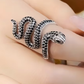 Adjustable snake ring wrapped around finger