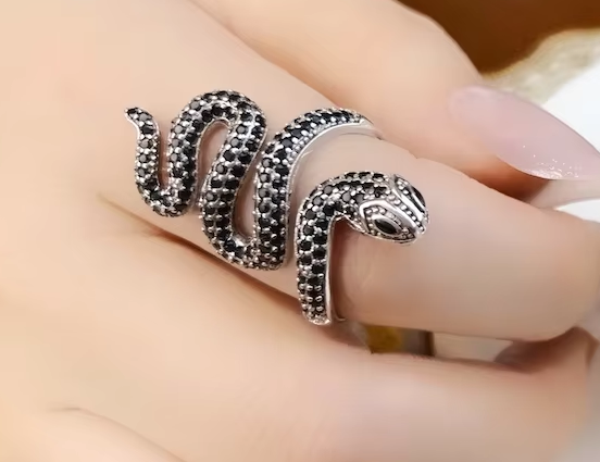 Adjustable snake ring wrapped around finger