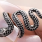 Black cubic zirconia snake jewelry side detail