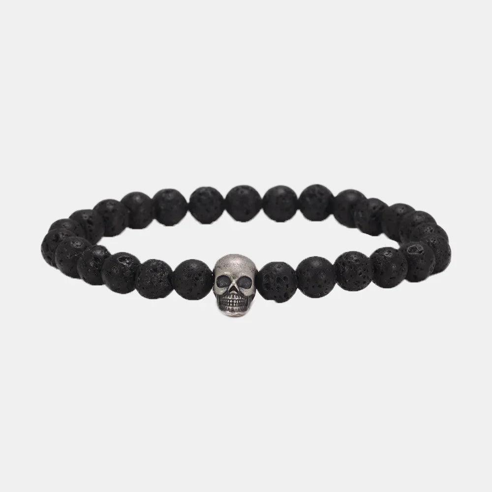 Black lava stone bead bracelet with a 925 sterling silver skull bead