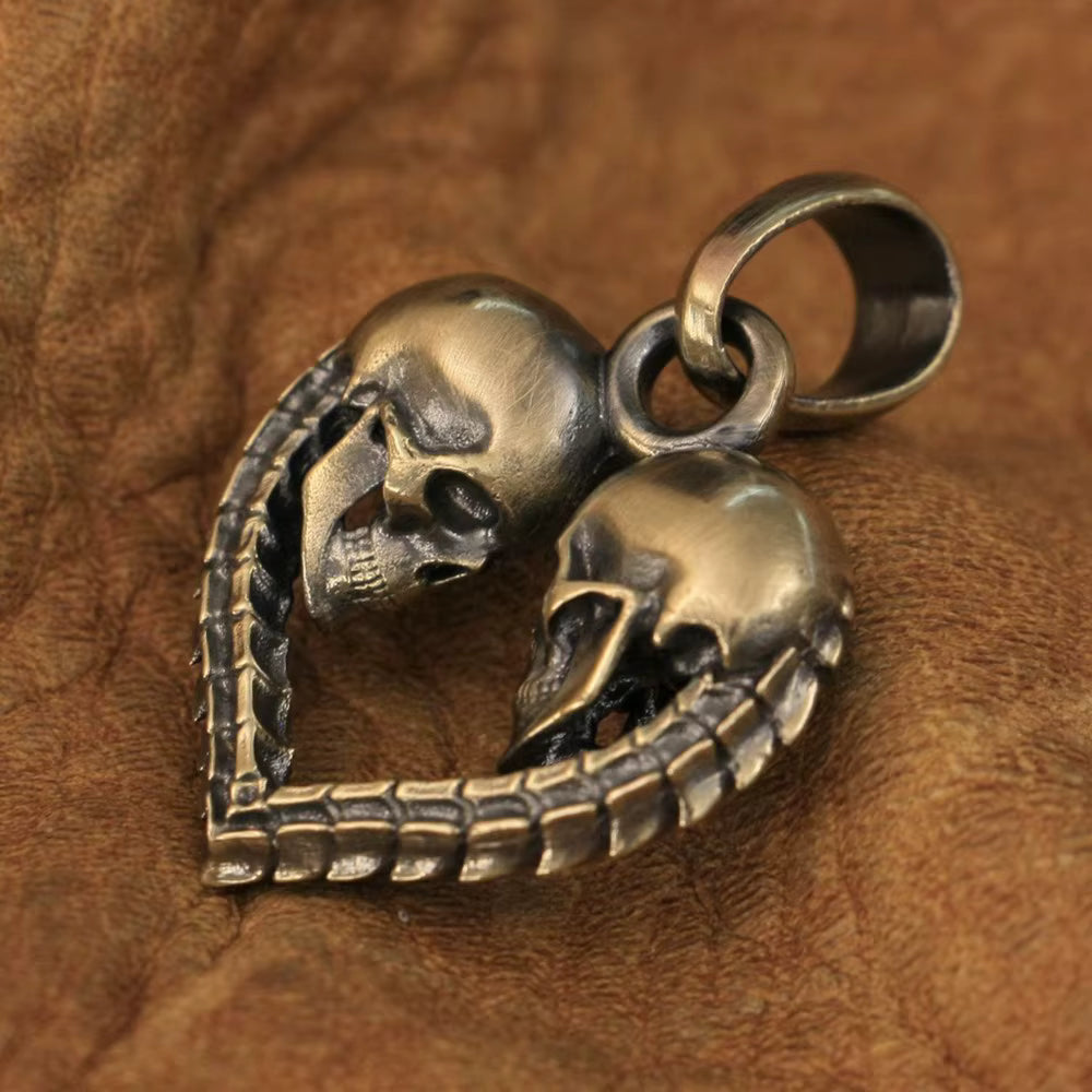 Brass skull heart pendant side view
