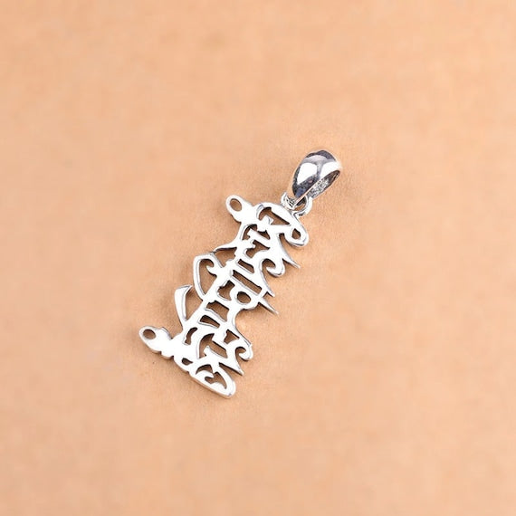 Buddhist OM pendant back view