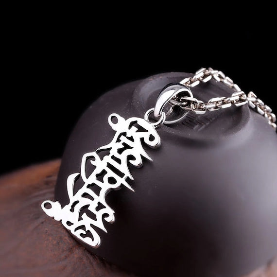 Buddhist pendant back view