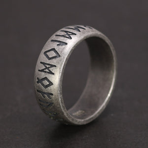 Close-up of Viking silver rune ring