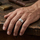 Authentic silver Supernatural family business ring worn on hand
