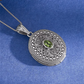 Detailed peridot gemstone locket pendant close up