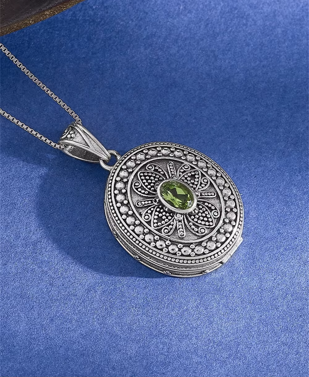 Detailed peridot gemstone locket pendant close up