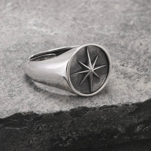 Front close up profile of oxidized silver North Star signet ring