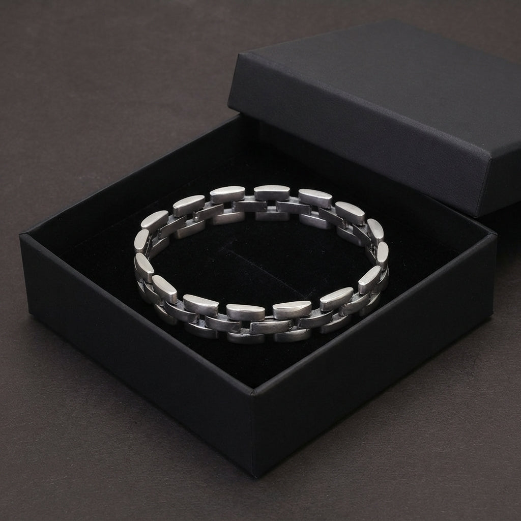 silver link bracelet inside black Jewelry box