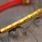 Red String OM Buddhist Bracelet Gold