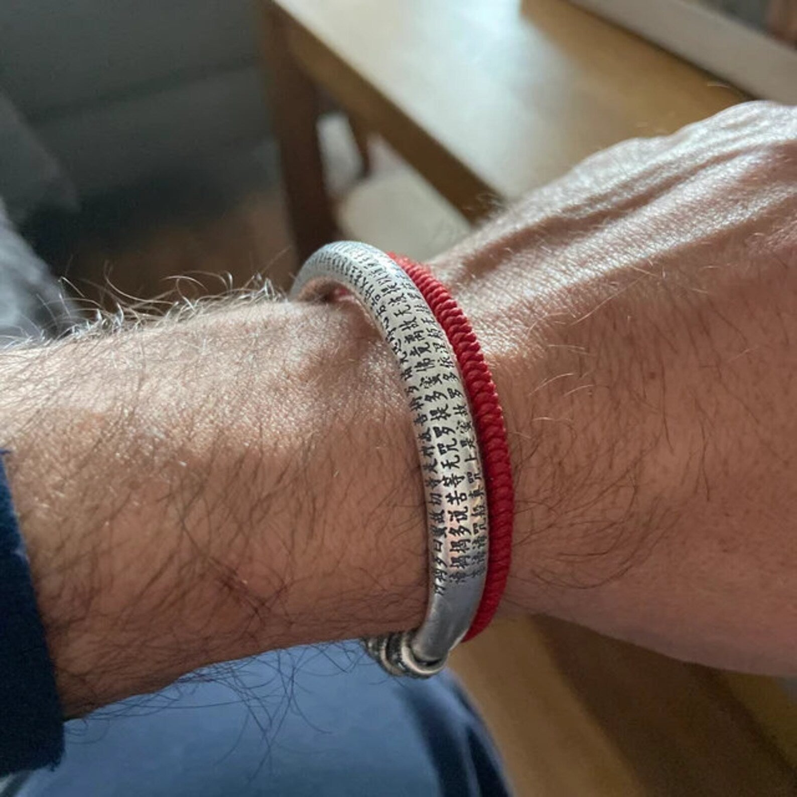 Heart Sutra Buddhist Tibetan Bracelet on men's wrist