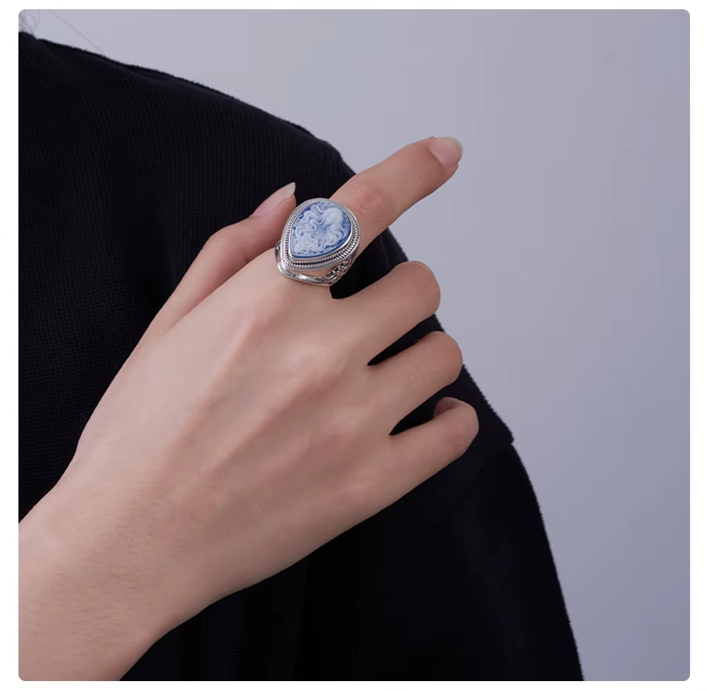 Sterling silver goddess cameo ring on a model hand finger