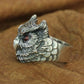 Owl ring side view showing detailed feathers in silver