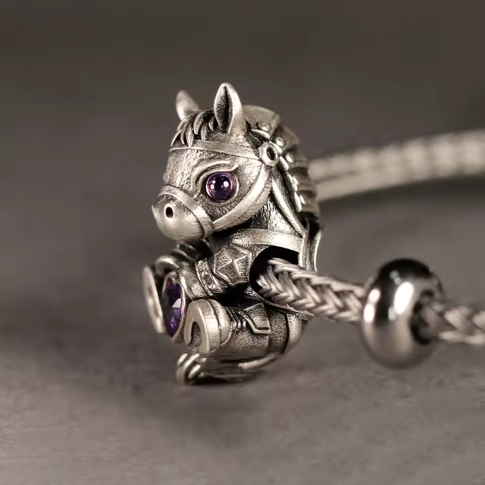 Pony charm purple crystal eyes  on rope bracelet 