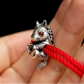 Pony charm red crystal eyes  on red bracelet 