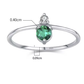 Round green zircon ring with prong setting close up