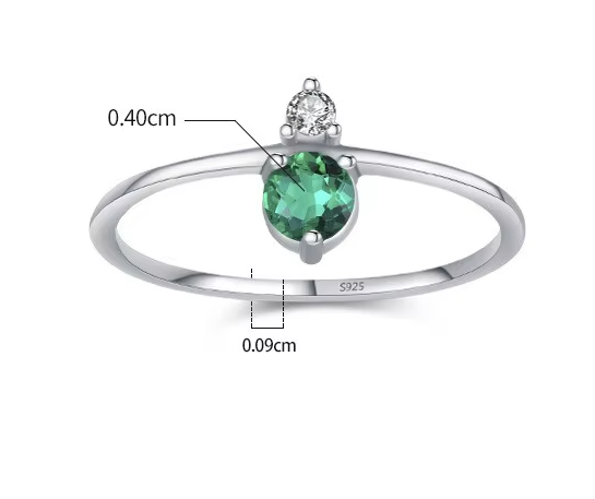 Round green zircon ring with prong setting close up