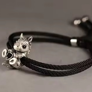 black crystal accent vintage horse charm on black rope
