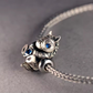 sterling silver horse charm  blue crystal eyes