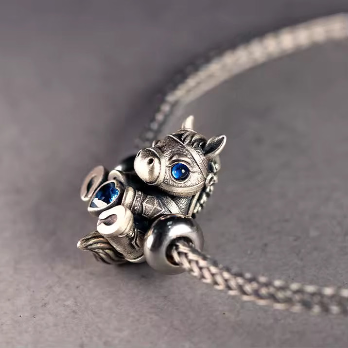 sterling silver horse charm  blue crystal eyes