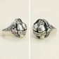 Side-by-side comparison shot showing two different angles (side profile and front view) of the silver butt ring on a light neutral surface