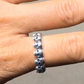 Silver skull statement ring on finger