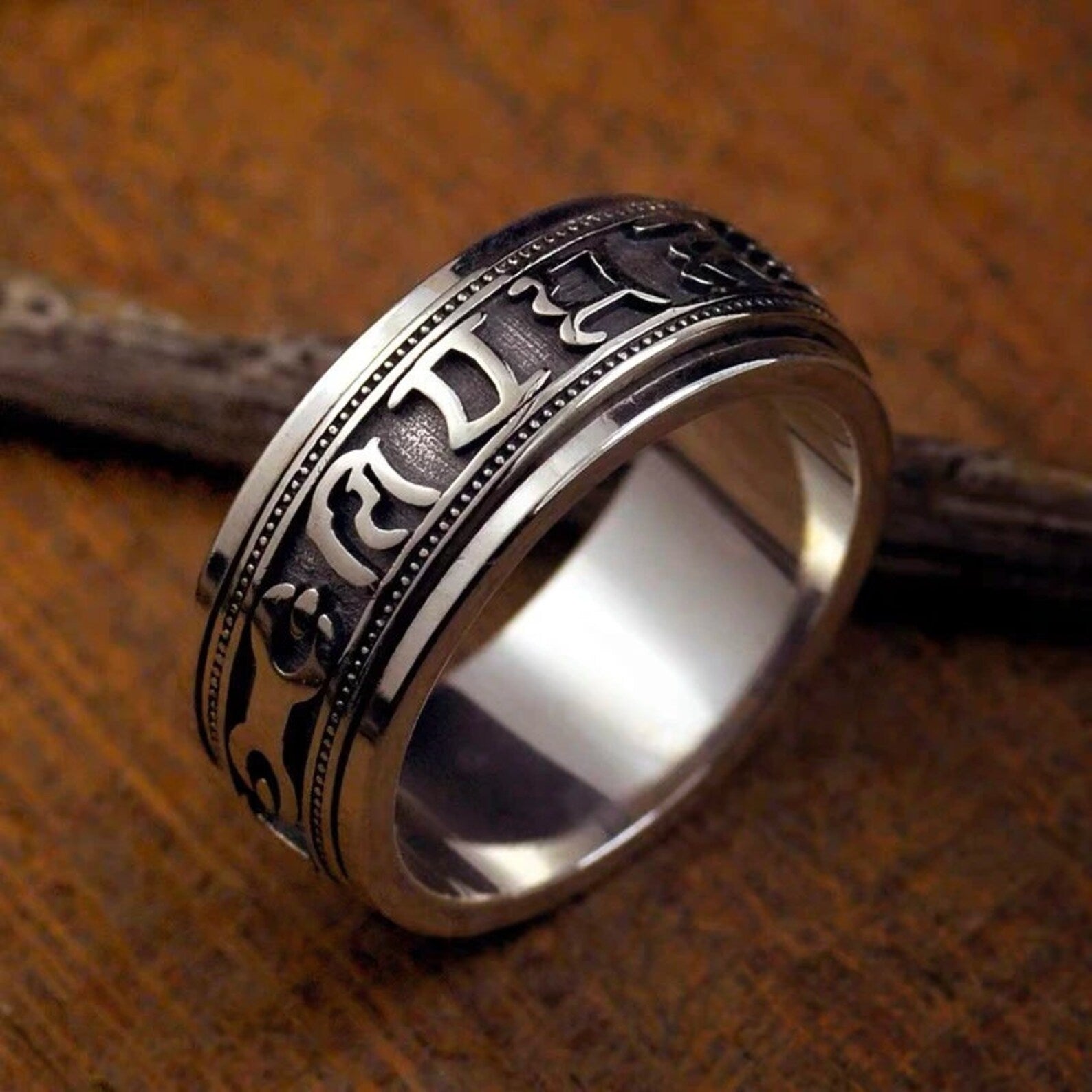 Sterling Silver om mani padme hum ring close up