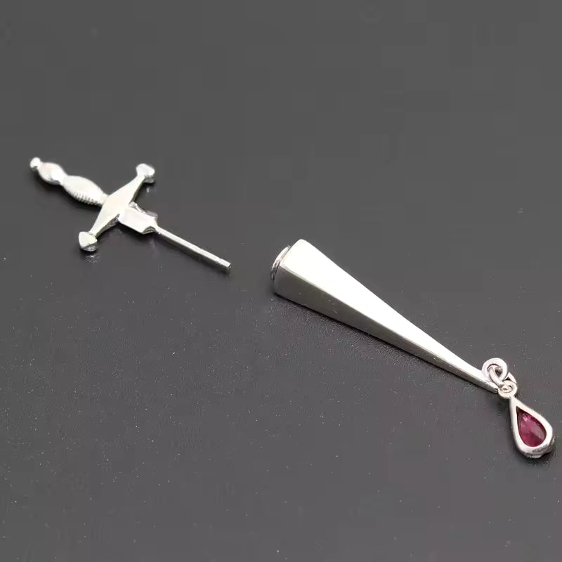 Sterling silver dagger earring with red crystal