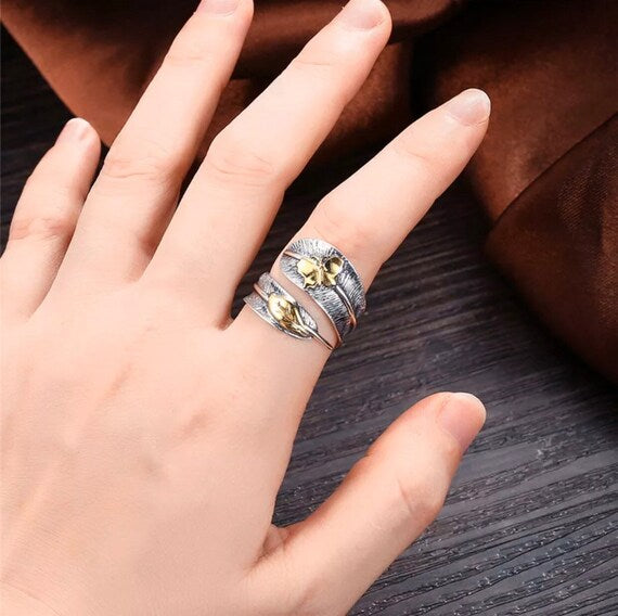 Sterling silver feather ring on hand