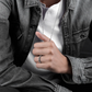Sterling silver skull ring worn on finger