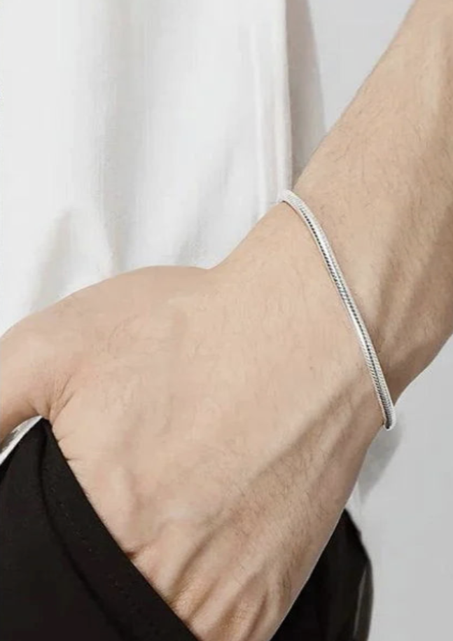 Sterling silver snake bracelet on wrist