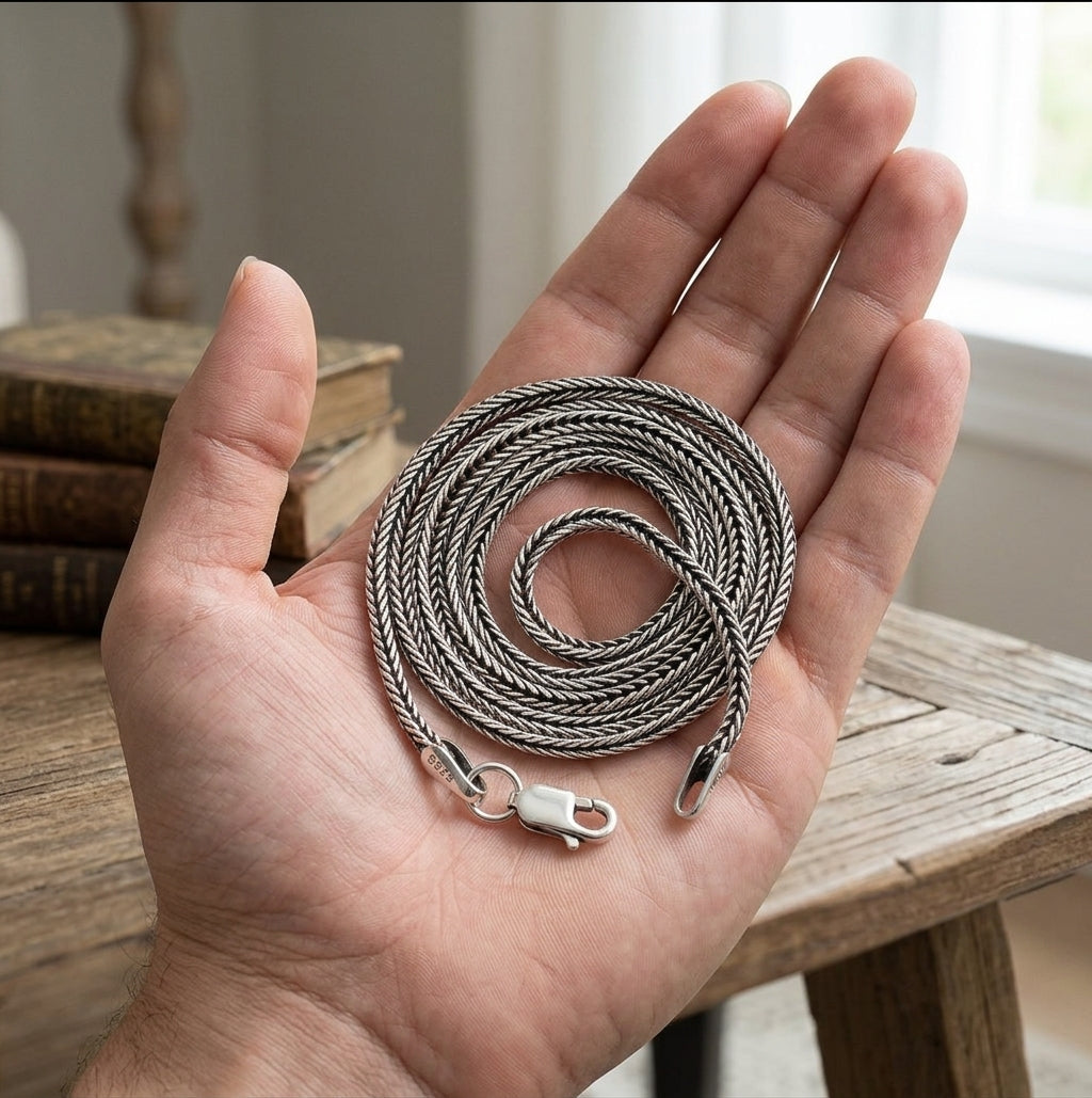 Sterling silver wheat chain on hand