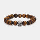 Tiger’s eye natural stone bead bracelet with a 925 sterling silver skull bead