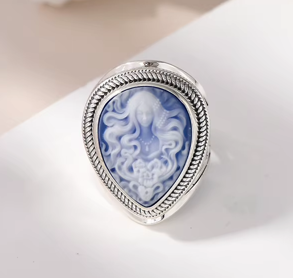 Vintage-style women’s ring with ornate silver setting
