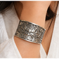 Woman wearing silver lotus cuff bracelet
