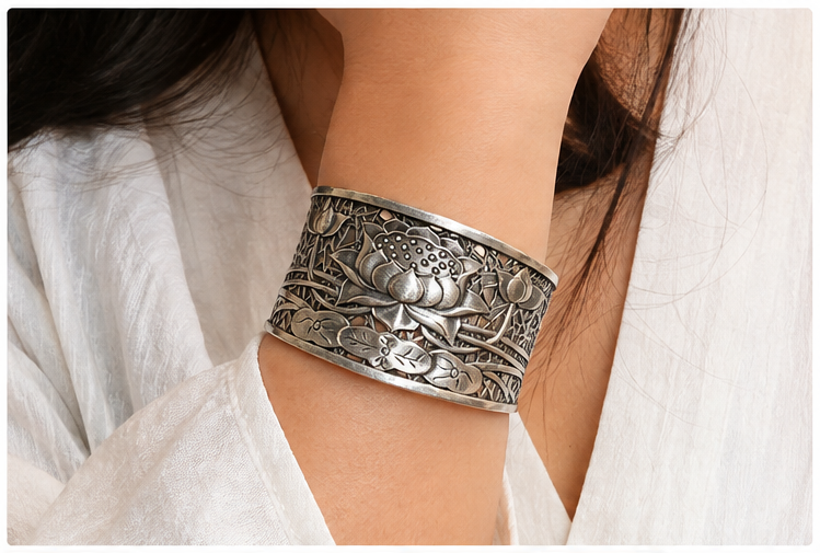 Woman wearing silver lotus cuff bracelet
