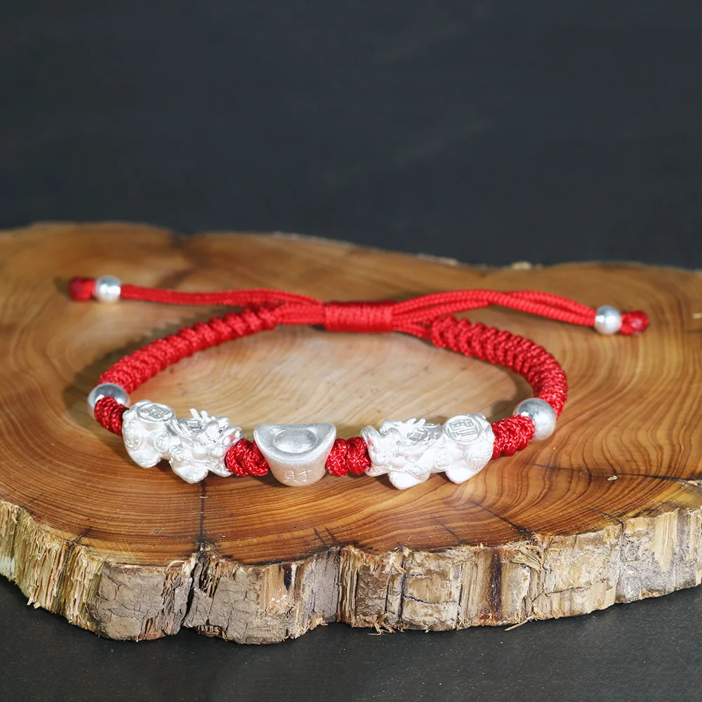 Adjustable red cord bracelet