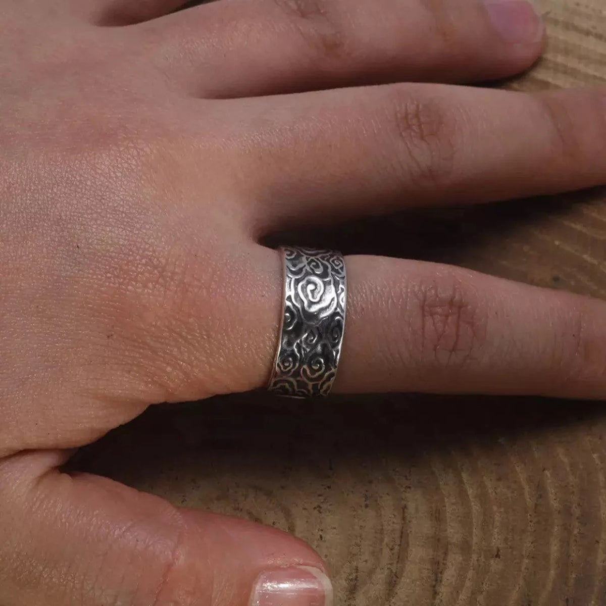 adjustable Buddhist meditation ring on finger