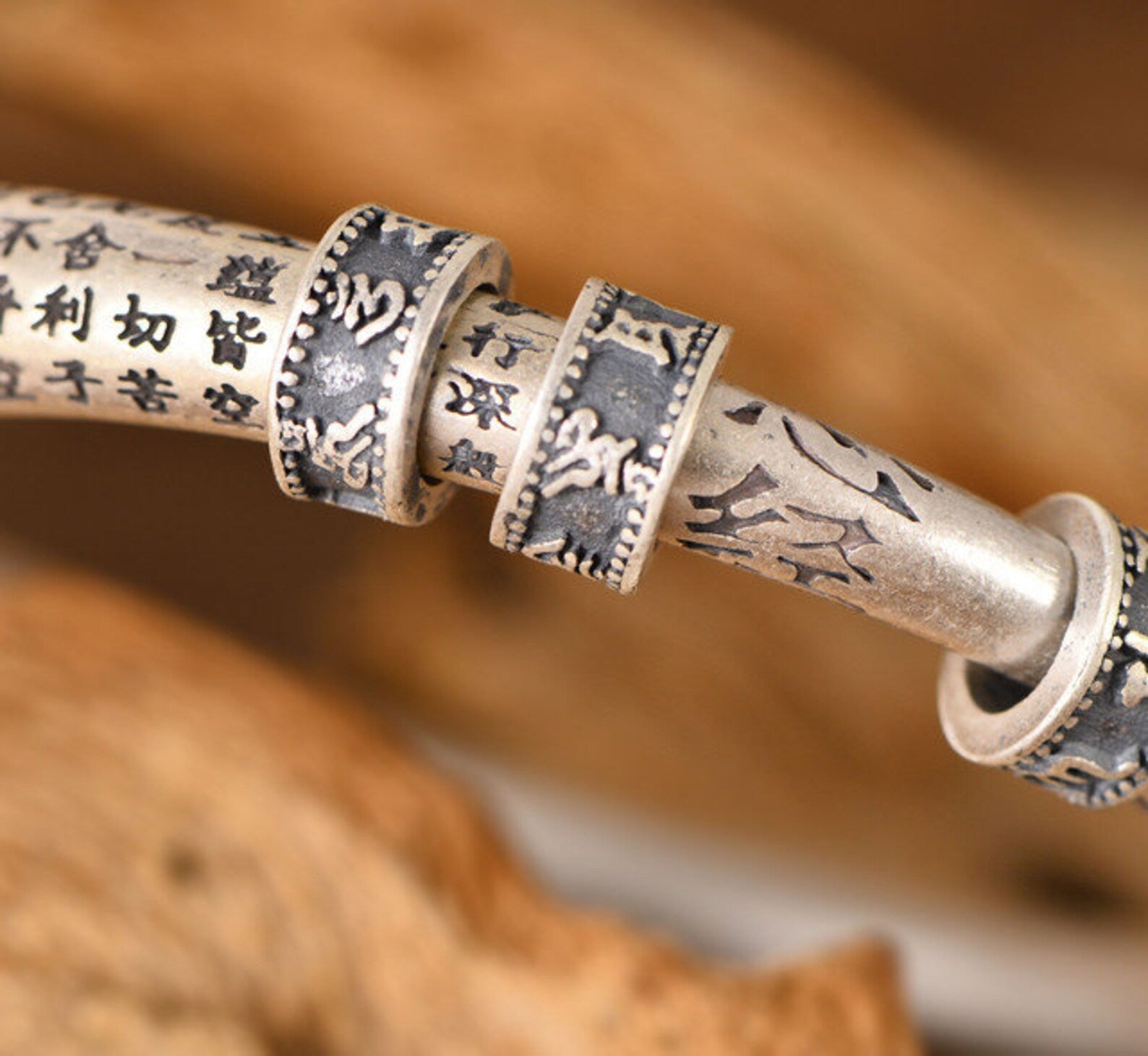 adjustable silver bangle with end caps