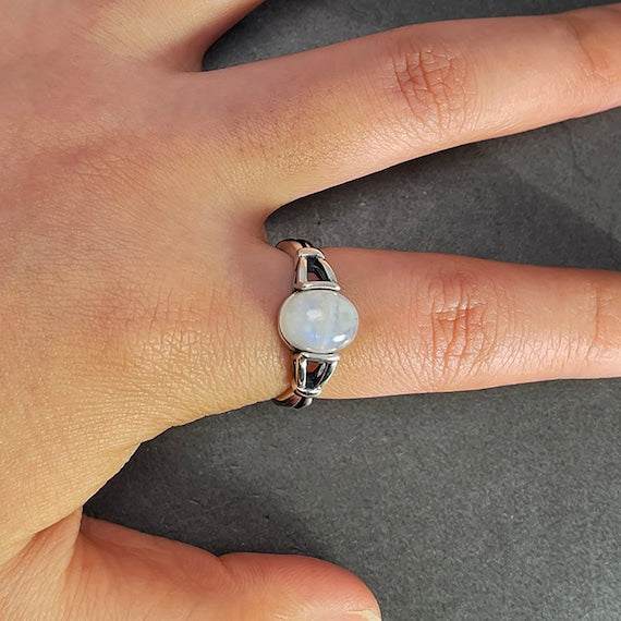 bella swan moonstone ring worn on finger