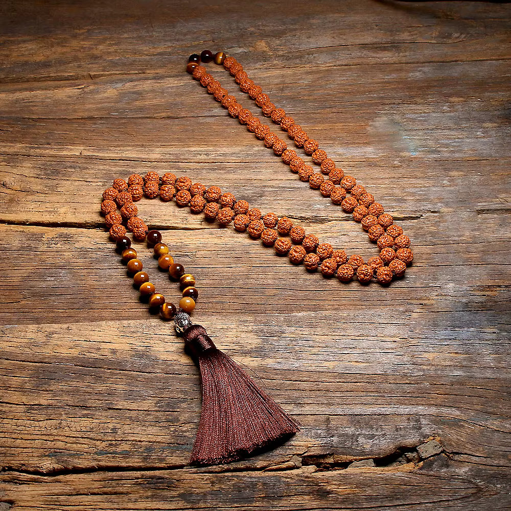 brown tassel mala necklace arranged flat