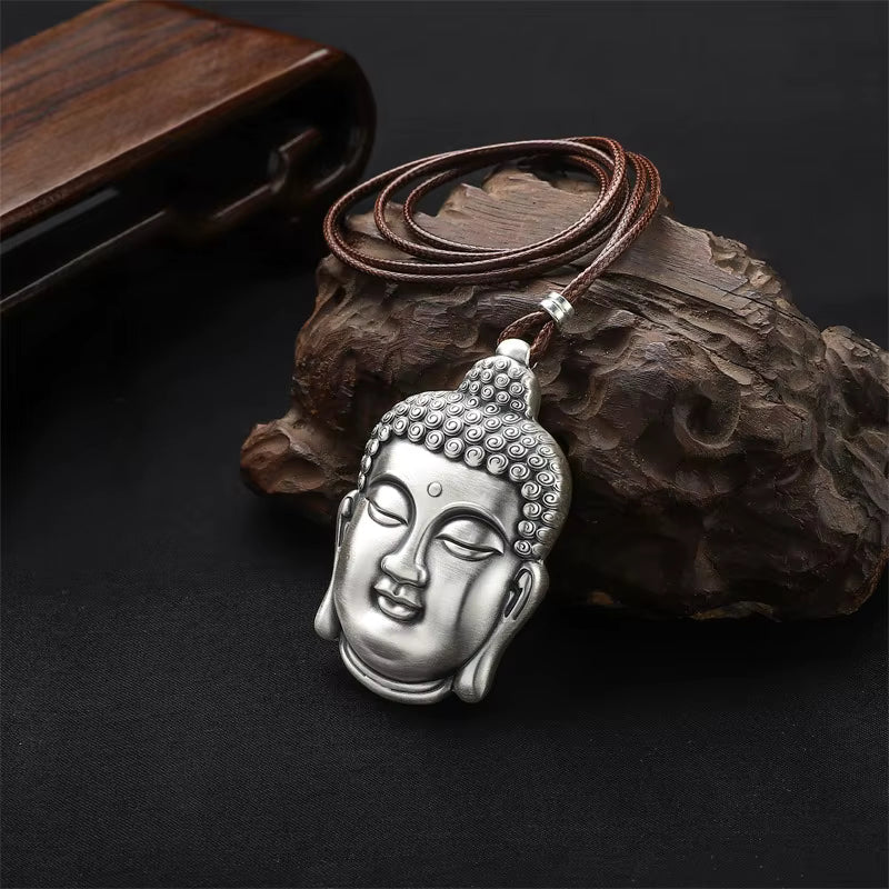 buddha pendant on cord with detailed texture