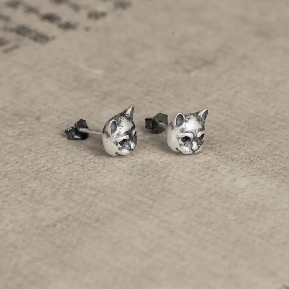 cat stud earrings side angle showing depth