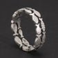 Sterling silver band with engraved fish pattern