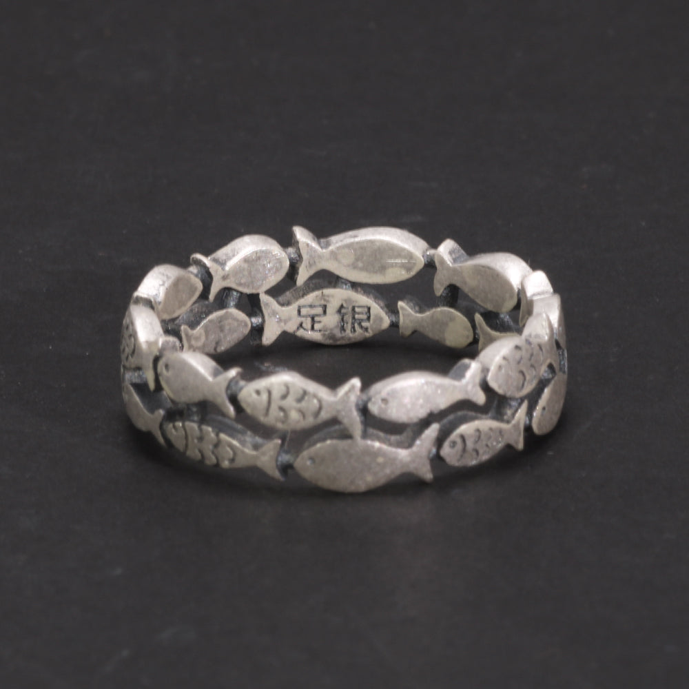 Oxidized silver ring with Asian-style character engravings