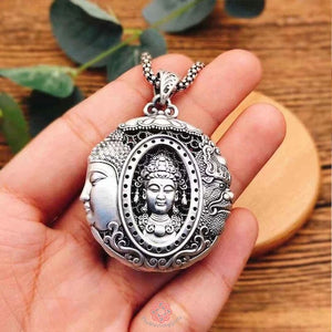 silver buddha pendant hand