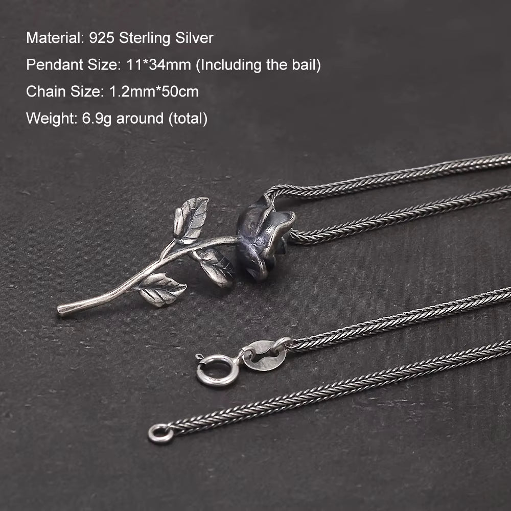 long silver chain with rose pendant front view